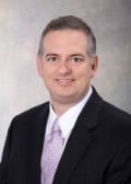 Racine, Russell M.