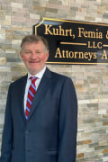Kuhrt, Richard L.
