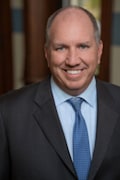 Reust, Scott E.