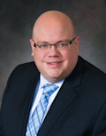 Plamann, Aaron D.