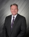 Mark L. Brasee