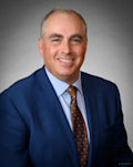 Schneiberg, Jerald A.