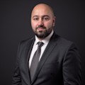 Camaj, Michael P.