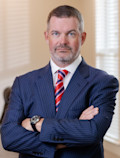 Cavanaugh, J. Eric