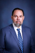 Román, Armando J.