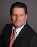 Branded image of Adam Chrzan PLLC, a law firm in Vero Beach, FL