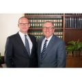 Branded image of Naumes Law Group, a law firm in Milton, MA